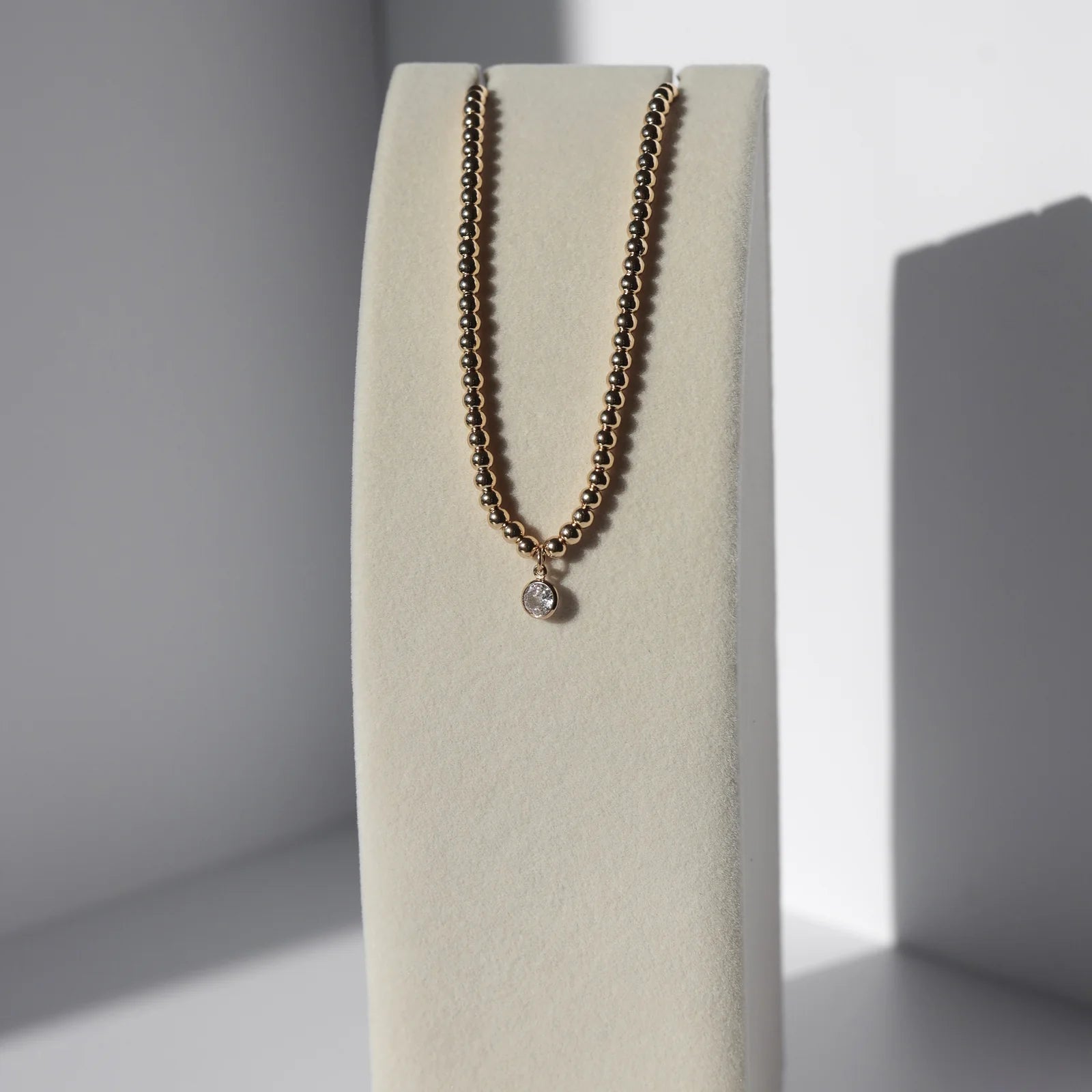 CRYSTAL CIRCLE BEADED NECKLACE